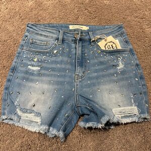 Denim jeweled shorts! With distressing and fray ! Size 6 with some stretch